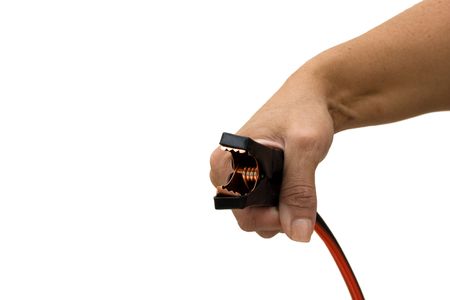 A hand holding a booster cable on a white background, getting a boostの写真素材
