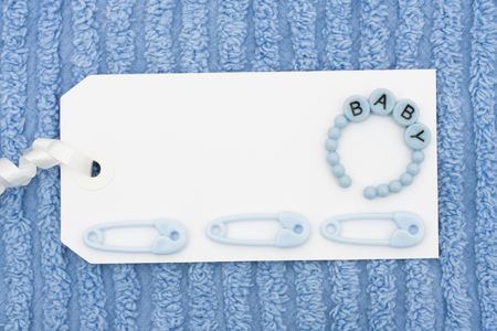 A blank gift tag with a blue background, baby giftの写真素材