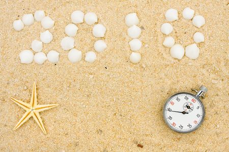 Seashells making a date in the sand, vacation 2010の写真素材