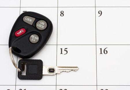 A set of car keys on a calendar, Car Payment is dueの写真素材