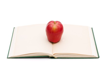 An open book with blank pages and an apple, Learningの写真素材