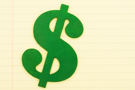Green Dollar Sign on a sheet of lined paper, Cost of education の写真素材