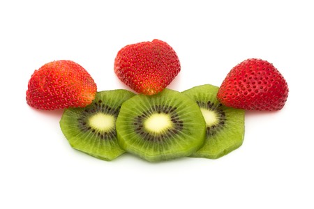 Slice of kiwi and strawberries isolated on white background, Healthy Foodの写真素材