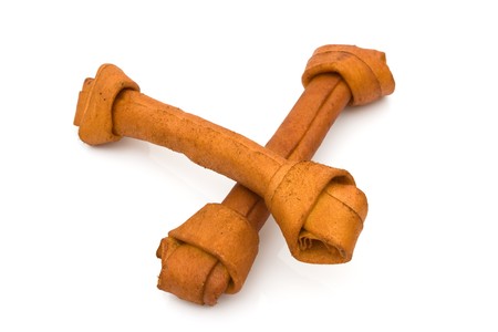 Two dog bones isolated on a white background, rawhide dog bonesの写真素材