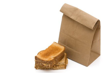 Two pieces of whole wheat toast isolated on a white background, Peanut butter sandwichの写真素材