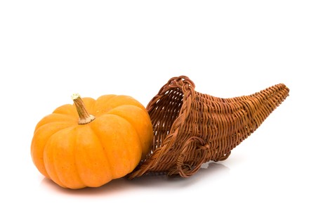 Large pumpkin with a Cornucopia isolated on white, Autumn の写真素材