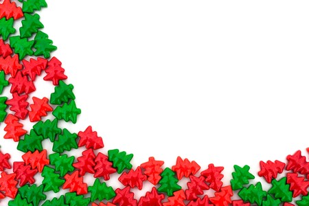 Red and green trees making a background isolated on white, Christmas Tree backgroundの写真素材