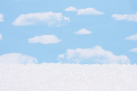 Snow on the ground with a sky background and copy space, winter sceneの写真素材