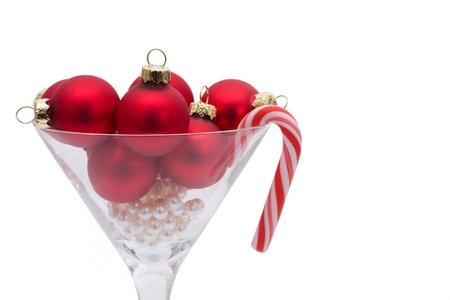 Red christmas balls in a martini glass isolated on a  white background, Christmas timeの写真素材