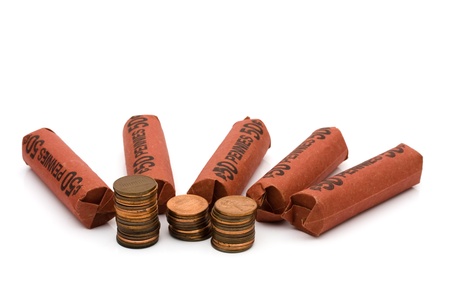 A lot of pennies with rolls of pennies isolated on white, Having a lot of money spare changeの写真素材