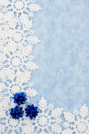 Snowflake border on a blue background, winter timeの写真素材