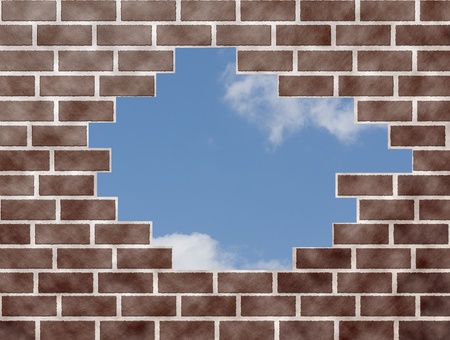 A brick wall pattern that is missing brisks and seeing sky in backgroundの写真素材