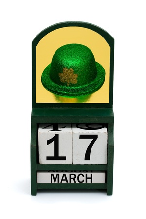 A wooden calendar with a date of March 17 and Irish hat, Happy Saint Patricks Dayの写真素材