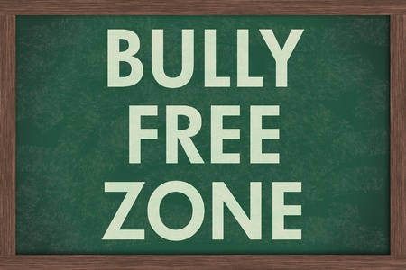 A chalkboard  with the chalk letters bully free zone, Bully Free Zone at schoolsの写真素材