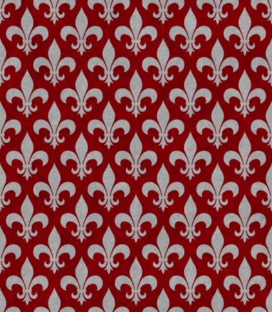 Red and Gray Fleur De Lis Textured Fabric Background that is seamless and repeatsの写真素材