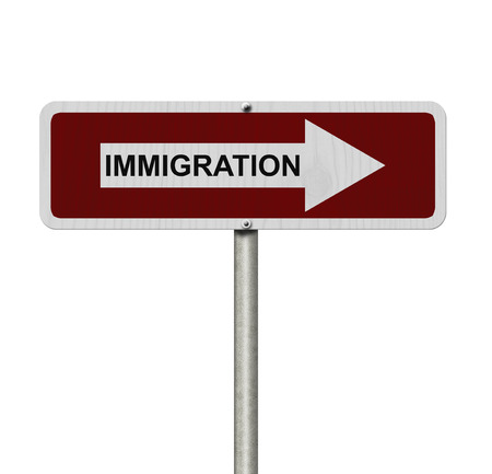 The way to Immigration, Red and white street sign with word Immigration isolated on whiteの写真素材