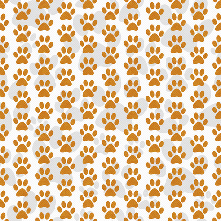 Orange and White Dog Paw Prints Tile Pattern Repeat Background that is seamless and repeatsの写真素材