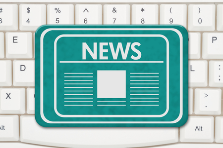News sign, A teal sign with text News and newspaper icon on a keyboardの写真素材