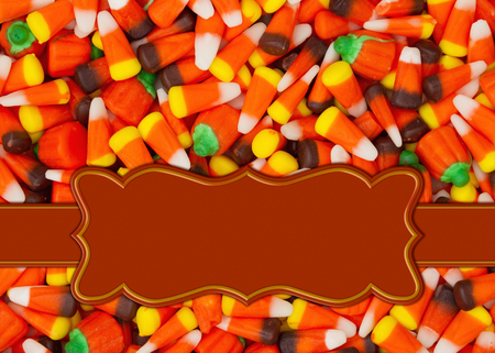 Halloween orange candy corn border with copy space for your message