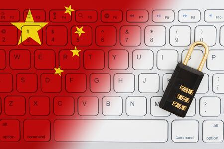 Chinese flag keyboard with a combination lock for internet securityの写真素材