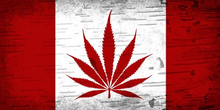 Canadian red cannabis leaf and strips flag with a textured grunge effectの写真素材