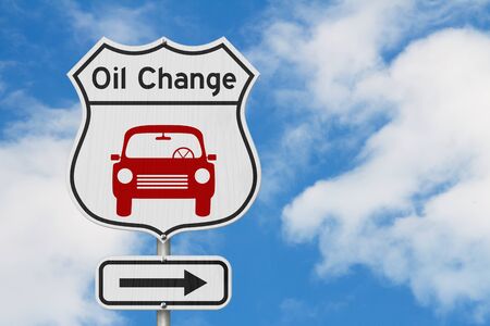 Oil change with car route 66 USA highway road sign with sky backgroundの写真素材