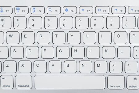 Close-up of a light gray computer keyboard for you internet message
