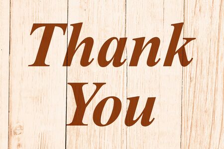 Thank You retro message on weathered sepia toned whitewash woodの写真素材