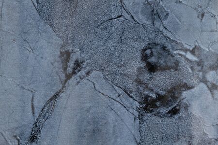 Dark blue marble textured paper