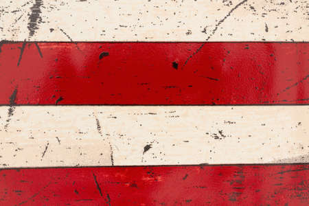 Red and white grunge textured metal material background with copy space for messageの写真素材