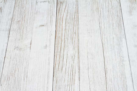Weathered whitewash wood textured material background with a perspective viewの写真素材