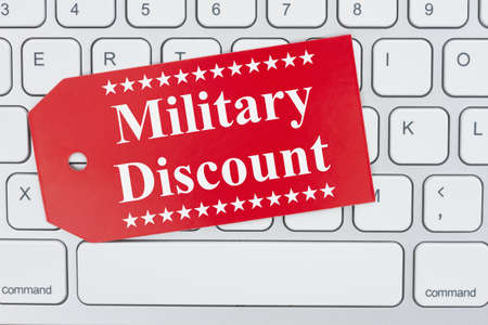 Military Discount message on a gift tag on gray keyboard for your online sales