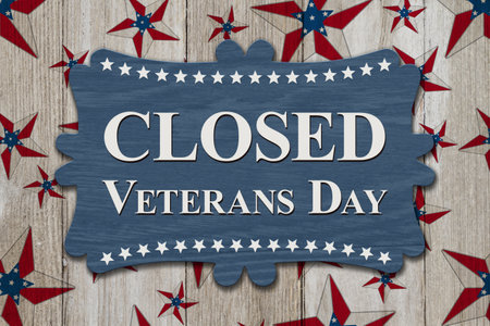 Closed Veterans Day sign with red, white, and blue US flag starsの写真素材