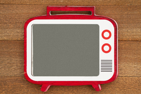Retro wood television on weathered wood mockup for your tv messageの写真素材