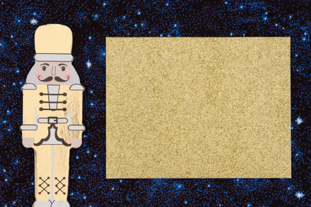 Blank gold greeting card with nutcracker on stars for your Christmas or seasonal message