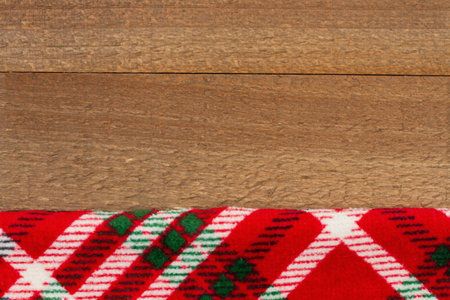 Buffalo plaid border material holiday background on weathered wood for your winter or seasonal messageの写真素材