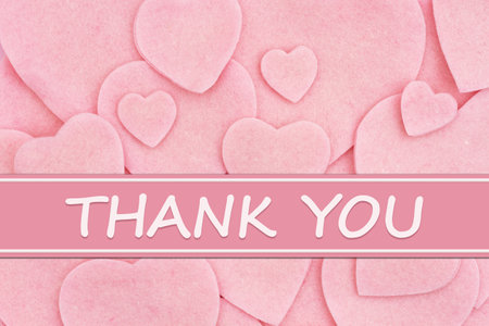 Thank You message with lots of pink hearts for saying thanks to your customersの写真素材