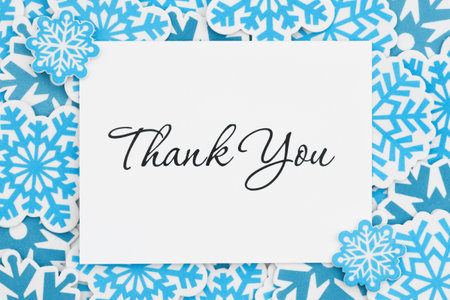 Thank you greeting card with blue snowflakes for winter thanksの写真素材