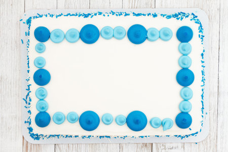 Blank white and blue flat sheet birthday cake for your celebration messageの写真素材
