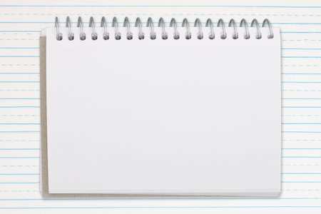 Blank notepad on double lined paper with space for your education message