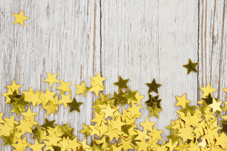 Gold star border on weathered wood for your great messageの写真素材