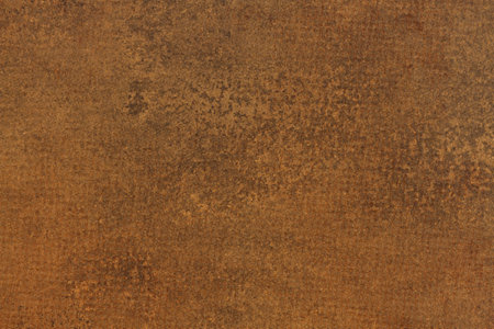 Old brown textured paper background with copy space for your message or use as a texture