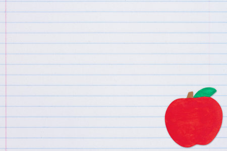 Wooden apple school background on ruled paper for you education or school messageの写真素材