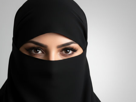 Beautiful Muslim woman in niqab, the woman eyes covered, black clothes on an Eastern woman, Islam, Ramadan holiday, Eastern people, people from the Caucasus. High qualityの素材