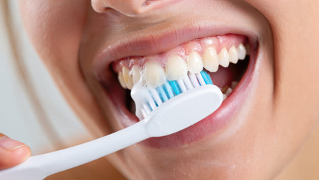 Brushing teeth with a toothbrush and toothpaste, Fresh breath, dental insurance, personal hygiene, brushing teeth in the morning, care from childhood, morning routine. High qualityの素材