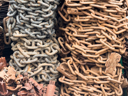 Old rusty anchor chains, large chain wrap, chains at the market. High quality