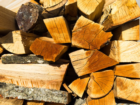 Wood blocks, logs for fireplace and fire, wooden background made of planks. High quality