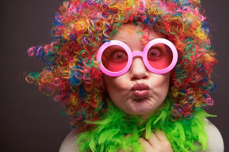 Portrait of beautiful party woman in wig and glasses Carneval Konzeptの写真素材