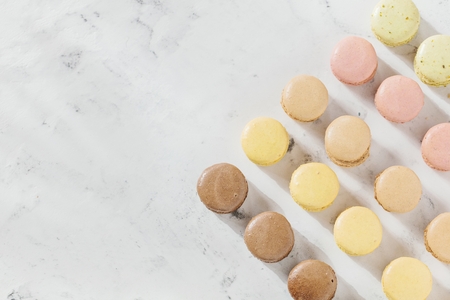 French macaroon cake. Macaroons on white background