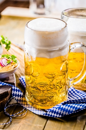 Fresh Oktoberfest Beer on Wooden Backgroundの写真素材